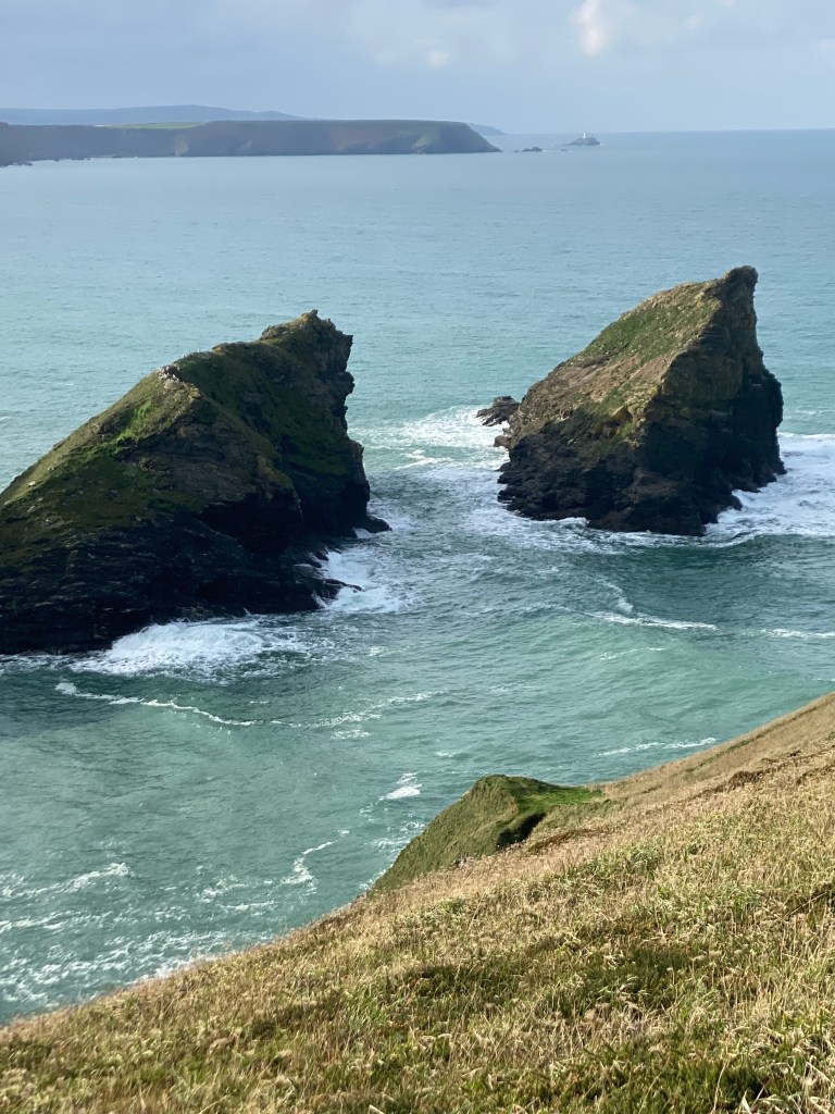 
South West Coast Path

The starting point at Minehead
Length	1,014 km (630 mi)
Location	England: Somerset, Devon, Cornwall & Dorset
Designation	UK National Trail
Trailheads	Minehead: 51.211°N 3.474°W
Poole: 50.680°N 1.950°W
Use	Hiking
Elevation change	total climbed is 114,931 feet (35,031 m)
Highest point	Great Hangman near Combe Martin, 318 m (1,043 ft)
Lowest point	sea level
Season	all year
Sights	Coastal scenery, much of it Heritage Coast
World Heritage Sites: Jurassic Coast and Cornwall and West Devon Mining Landscape
Hazards	Cliff paths, river crossings (ferries with limited availability), closure of Lulworth Ranges
National Trails
Acorn_Britain_National_Trails_Symbol-black
Acorn symbol used to guide the route of National Trails
England
Wales
Cross-border
vte
The South West Coast Path is England's longest waymarked long-distance footpath and a National Trail. It stretches for 630 miles (1,014 km), running from Minehead in Somerset, along the coasts of Devon and Cornwall, to Poole Harbour in Dorset. Because it rises and falls with every river mouth, it is also one of the more challenging trails. The total height climbed has been calculated to be 114,931 ft (35,031 m), almost four times the height of Mount Everest.[1] It has been voted 'Britain's Best Walking route'[2] twice in a row by readers of The Ramblers' Walk magazine, and regularly features in lists of the world's best walks.[3]

The final section of the path was designated as a National Trail in 1978.[4] Many of the landscapes which the South West Coast Path crosses have special status, either as a national park or one of the heritage coasts. The path passes through two World Heritage Sites: the Dorset and East Devon Coast, known as the Jurassic Coast, was designated in 2001,[5] and the Cornwall and West Devon Mining Landscape in 2007.[6]

In the 1990s it was thought that the path brought £150 million into the area each year,[7] but new research in 2003 indicated that it generated around £300 million a year in total, which could support more than 7,500 jobs.[4] This research also recorded that 27.6% of visitors to the region came because of the Path, and they spent £136 million in a year. Local people took 23 million walks on the Path and spent a further £116 million, and other visitors contributed the remainder. A further study in 2005 estimated this figure to have risen to around £300 million.[8] Following investment through the Rural Development Programme for England, more detailed research was undertaken in 2012, and this found the annual spend by walkers to have risen to £439 million which sustains 9771 full-time equivalent jobs.[9]
