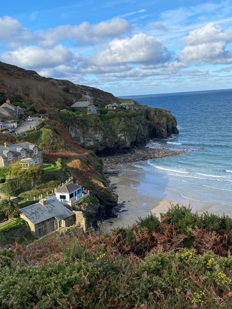 
South West Coast Path

The starting point at Minehead
Length	1,014 km (630 mi)
Location	England: Somerset, Devon, Cornwall & Dorset
Designation	UK National Trail
Trailheads	Minehead: 51.211°N 3.474°W
Poole: 50.680°N 1.950°W
Use	Hiking
Elevation change	total climbed is 114,931 feet (35,031 m)
Highest point	Great Hangman near Combe Martin, 318 m (1,043 ft)
Lowest point	sea level
Season	all year
Sights	Coastal scenery, much of it Heritage Coast
World Heritage Sites: Jurassic Coast and Cornwall and West Devon Mining Landscape
Hazards	Cliff paths, river crossings (ferries with limited availability), closure of Lulworth Ranges
National Trails
Acorn_Britain_National_Trails_Symbol-black
Acorn symbol used to guide the route of National Trails
England
Wales
Cross-border
vte
The South West Coast Path is England's longest waymarked long-distance footpath and a National Trail. It stretches for 630 miles (1,014 km), running from Minehead in Somerset, along the coasts of Devon and Cornwall, to Poole Harbour in Dorset. Because it rises and falls with every river mouth, it is also one of the more challenging trails. The total height climbed has been calculated to be 114,931 ft (35,031 m), almost four times the height of Mount Everest.[1] It has been voted 'Britain's Best Walking route'[2] twice in a row by readers of The Ramblers' Walk magazine, and regularly features in lists of the world's best walks.[3]

The final section of the path was designated as a National Trail in 1978.[4] Many of the landscapes which the South West Coast Path crosses have special status, either as a national park or one of the heritage coasts. The path passes through two World Heritage Sites: the Dorset and East Devon Coast, known as the Jurassic Coast, was designated in 2001,[5] and the Cornwall and West Devon Mining Landscape in 2007.[6]

In the 1990s it was thought that the path brought £150 million into the area each year,[7] but new research in 2003 indicated that it generated around £300 million a year in total, which could support more than 7,500 jobs.[4] This research also recorded that 27.6% of visitors to the region came because of the Path, and they spent £136 million in a year. Local people took 23 million walks on the Path and spent a further £116 million, and other visitors contributed the remainder. A further study in 2005 estimated this figure to have risen to around £300 million.[8] Following investment through the Rural Development Programme for England, more detailed research was undertaken in 2012, and this found the annual spend by walkers to have risen to £439 million which sustains 9771 full-time equivalent jobs.[9]